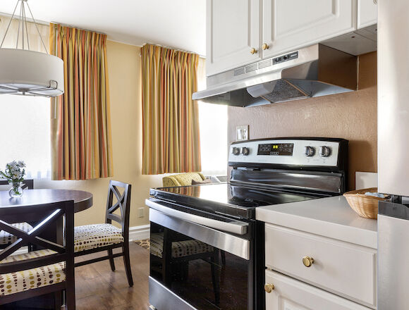 full kitchen with dining, living room